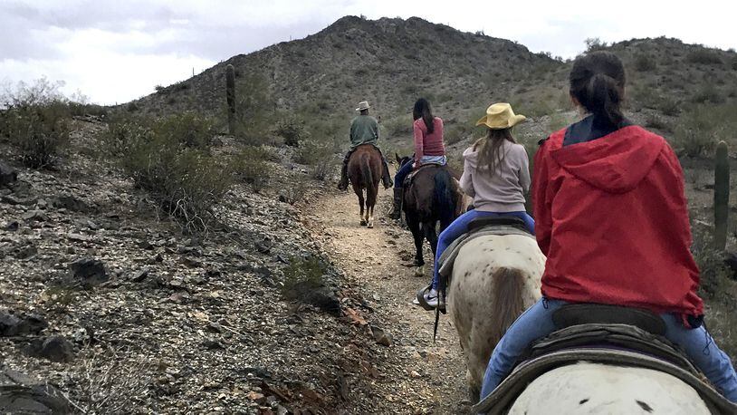 Riders wend their way along a trail through Estrella Mountain Regional Park. (Sue Campbell/Minneapolis Star Tribune/TNS)