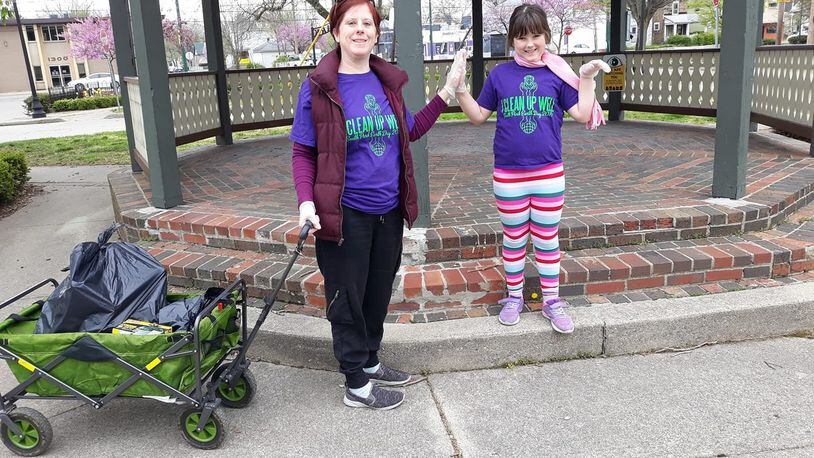 Amy Kennedy and her daughter glove-up on Earth Day to help with the South Park Cleanup.