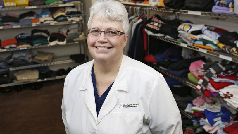 Cindy Feltner, trauma clinic nurse, stands inside Cindy’s Closet at Miami Valley Hospital. CONTRIBUTED