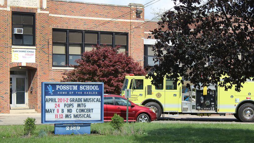 Springfield Twp. Fire Department investigate a natural gas leak at Possum School on Tuesday, May 2. School has been closed three days in the last week. JEFF GUERINI/STAFF