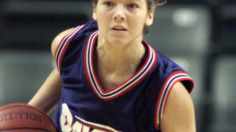 Christi Hester was a Dayton Flyers hoops star before marrying Xavier coach Chris Mack.