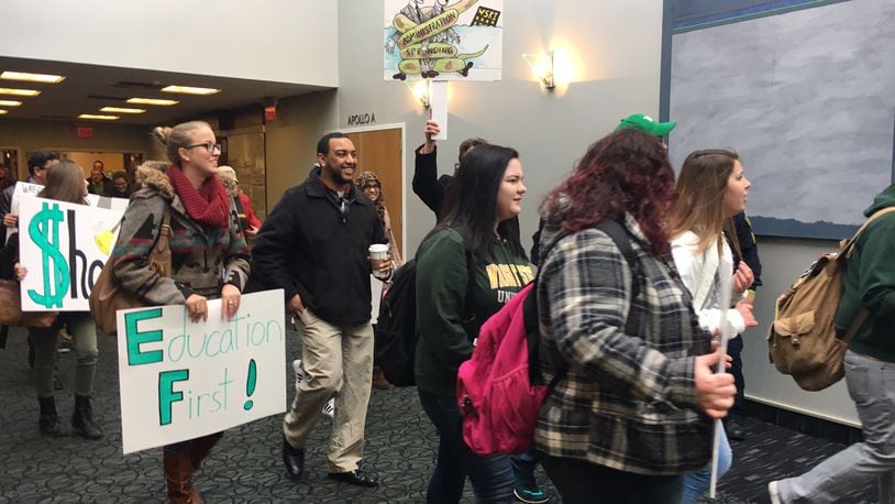 FILE: Wright State University students protested on Friday, April 7, 2017, before officials announced it will begin immediately cutting expenses campus wide to meets its goal of $25 million reduction goal. Students held signs, such as Release the Audit and Cut Administration Not Education, critical of the decisions. JOSH SWEIGART / STAFF