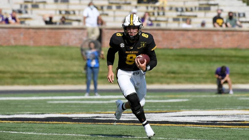 Missouri quarterback Connor Bazelak scrambles during the first half of an NCAA college football game against LSU Saturday, Oct. 10, 2020, in Columbia, Mo. (AP Photo/L.G. Patterson)