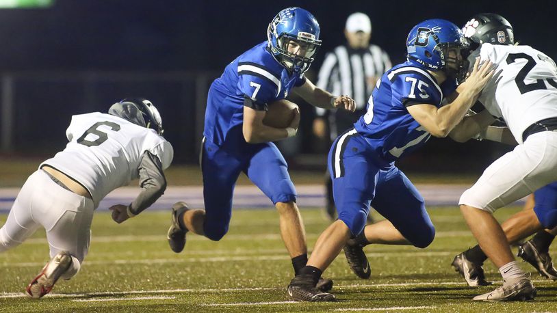 Brookville High School junior Tim Davis runs the ball during their game against Franklin on Thursday night in Brookville. Davis rushed for two touchdowns as the Blue Devils won 21-7. CONTRIBUTED PHOTO BY MICHAEL COOPER
