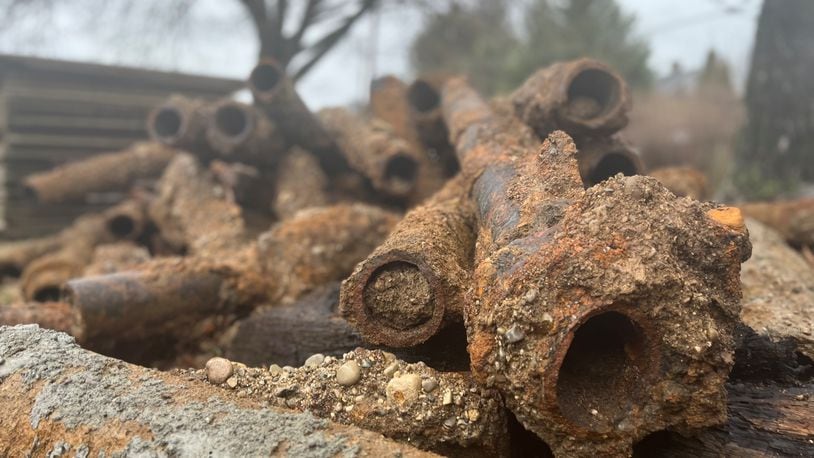Old and likely abandoned utility pipes that were removed in the South Park area. New water mains are being installed on multiple streets in South Park, and these pipes may have been removed during the infrastructure project. CORNELIUS FROLIK / STAFF