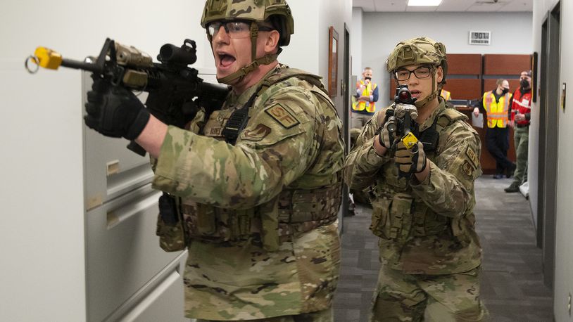 Senior Airman Andrew Barnes, 88th Security Forces Squadron, takes point as Defenders respond to an active-shooter exercise Feb. 23, 2022, at Wright-Patterson Air Force Base. The base is planning another active shooter exercise Wednesday Aug. 10. (U.S. Air Force photo by R.J. Oriez)