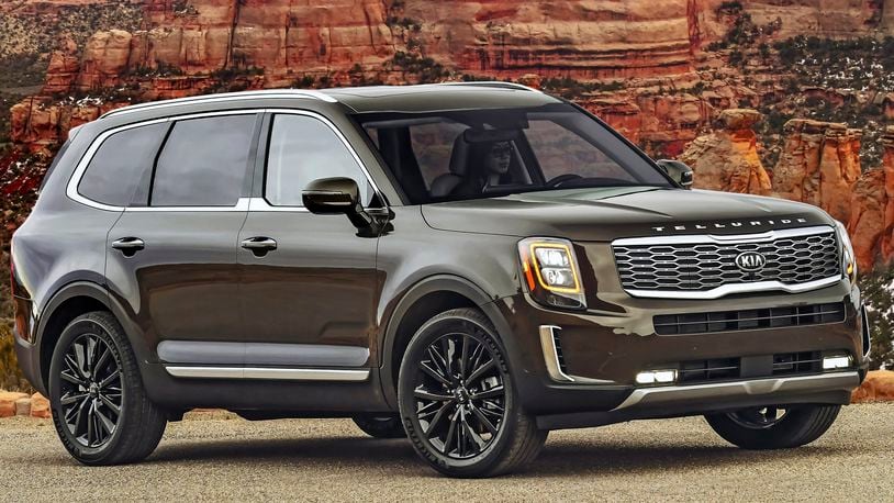 The 2021 Kia Telluride retains its crown as the Best 3-Row SUV for Families. It stands out from the competition with its more premium look and feel. (Greg Jarem/Kia Motors via AP)