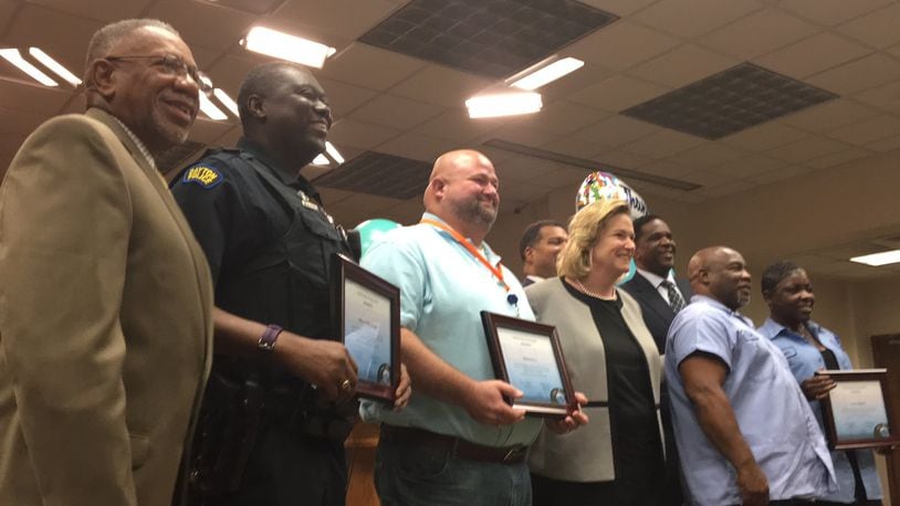Dayton City Commissioners honored city employees from various departments for their service to residents. CORNELIUS FROLIK / STAFF