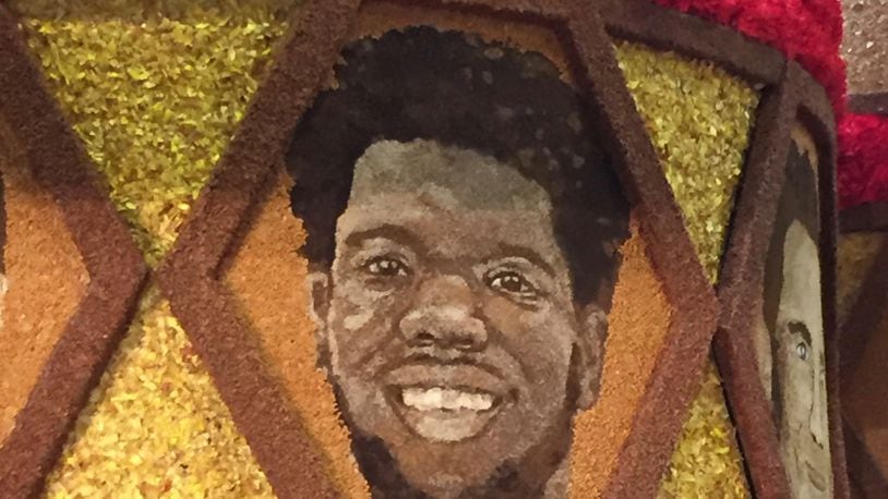 Late Dayton center Steve McElvene's picture is made out of flowers on a Donate Life float that will be in the Rose Bowl Parade on Jan. 1, 2019, in Pasadena, Calif. Photo by Jenell Shoals