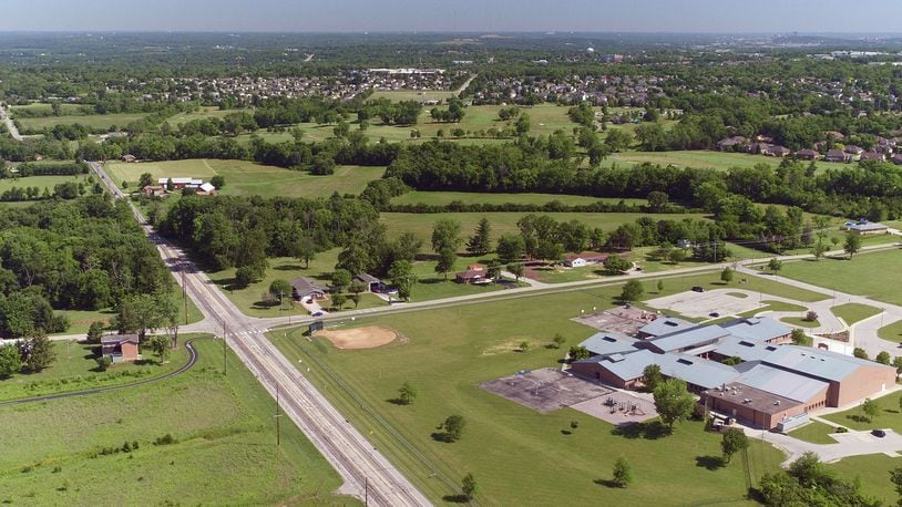 An annexation deal for 41 acres about a mile from a growing I-75 interchange may bring more than 100 new homes to Miamisburg and additional tax revenue for Miami Twp. TY GREENLEES / STAFF