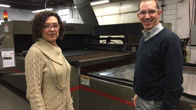 Angelia Erbaugh, president of the Dayton Region Manufacturers Association, and Jim Bowman, chief operating officer at Moraine’s Rack Processing Co. Inc., say DRMA want to raise $1 million for manufacturing workforce development. THOMAS GNAU/STAFF