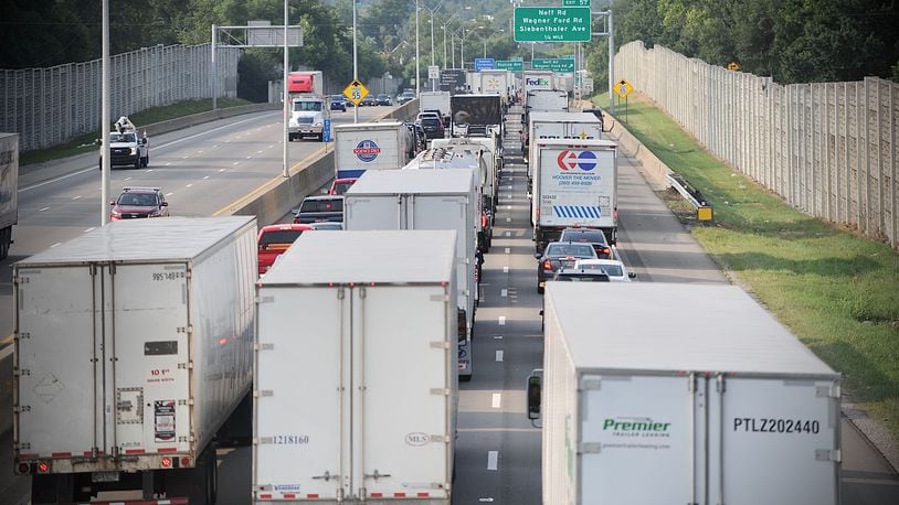 Traffic backed up for miles July 30, 2021, on Interstate 75 south after a fatal crash near Stanley Avenue in Dayton closed the southbound lanes. MARSHALL GORBY / STAFF