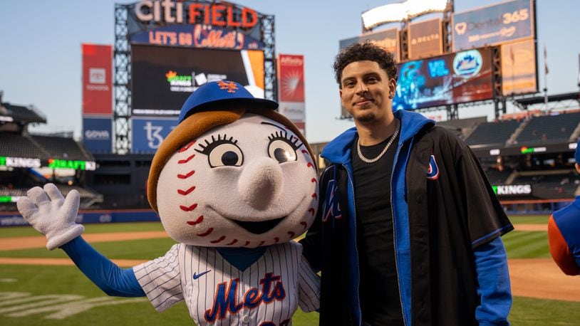 Koby Brea poses for a photo with Mr. Met on Tuesday, Sept. 27, 2022, at Citi Field in Queens, N.Y. Brea threw out the first pitch before a Mets game. Photo by Ryan Phillips