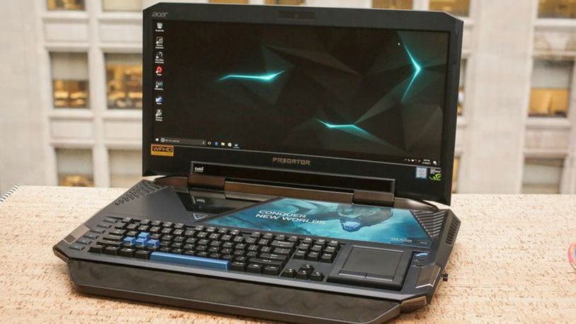 The limited-edition Acer Predator 21 X is equal parts insanely powerful and crazy cool — you just need a lottery win or random inheritance to afford it. (Sarah Tew/CNET/TNS)