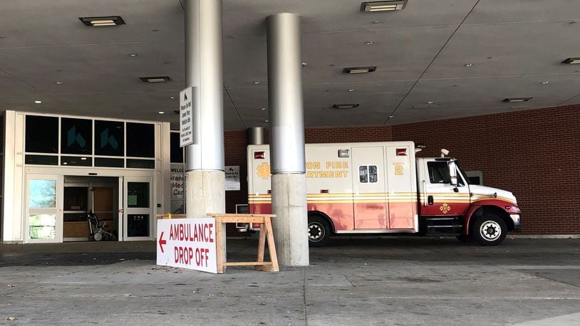 A Dayton Fire Department medic unit at a local hospital’s emergency room entrance. CORNELIUS FROLIK / STAFF