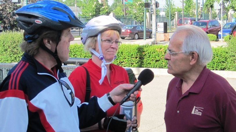 Bill Nance and Melody Morris of Faith And Friends Radio interviewing Ken Clarkston, Director of the Dayton Gospel Mission during a break 25 miles into the 100-mile ride last year at their South Main Street campus. CONTRIBUTED