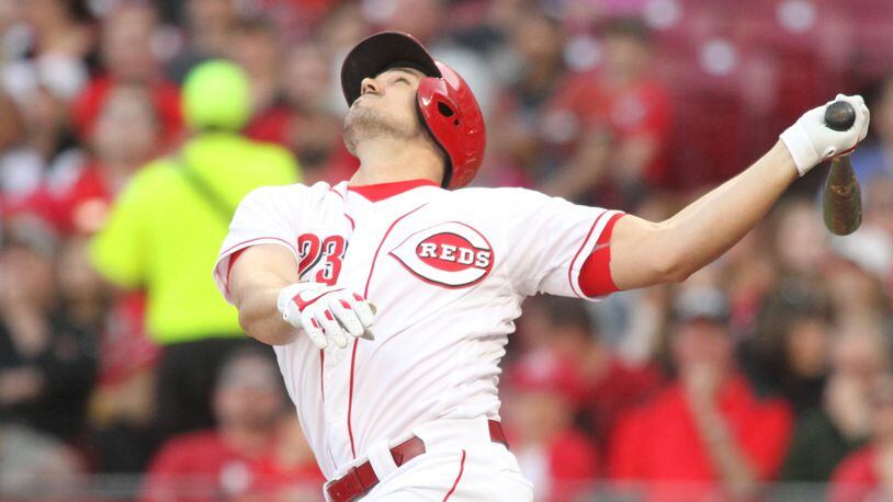 The Reds’ Adam Duvall swings against the Mets on Monday, May 7, 2018, at Great American Ball Park in Cincinnati. David Jablonski/Staff
