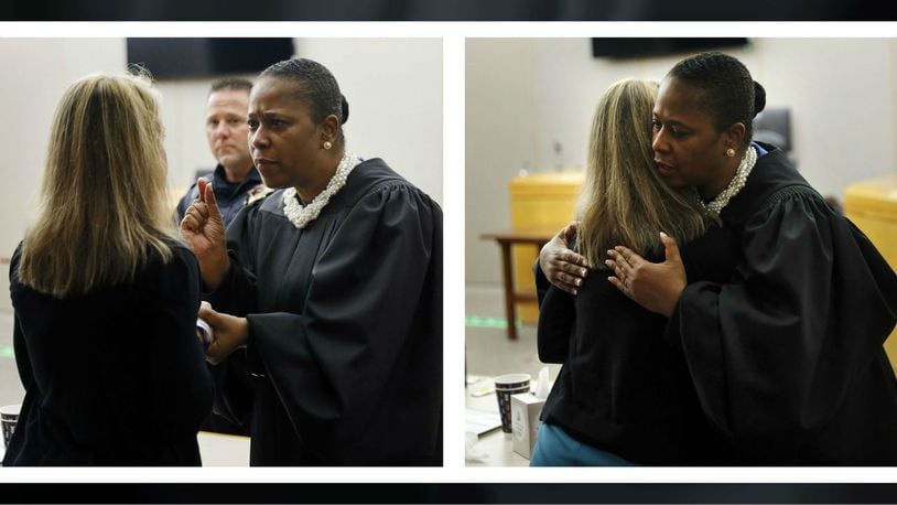 District Judge Tammy Kemp gives encouragement and a hug to convicted killer and ex-Dallas cop Amber Guyger Wednesday, Oct. 2, 2019, before she is taken to jail. Guyger, 31, was sentenced to 10 years in prison for killing Botham Jean in 2018.