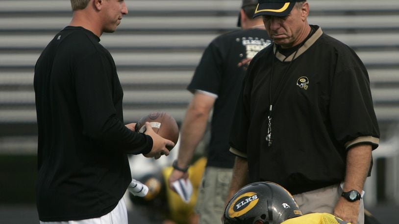 Brett Ullery (left) was an assistant for his father Ron Ullery at Centerville in 2008. Jim Noelker/Dayton Daily News