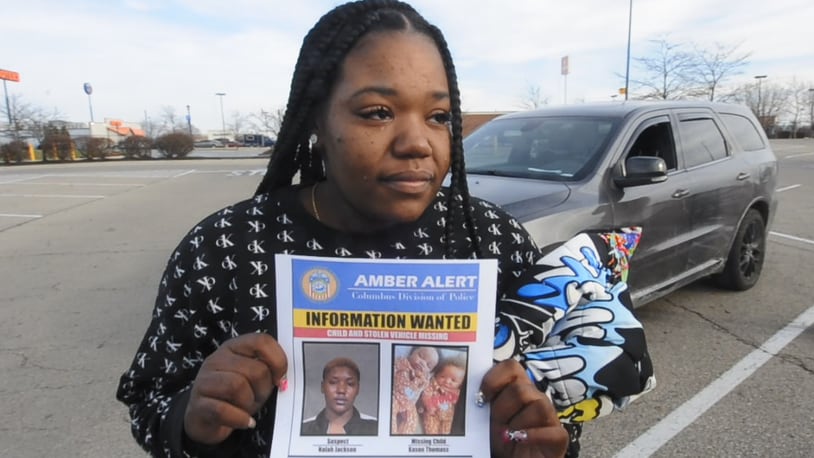 Wilhelmina Barnett, the mother of missing 5-month-old Kason Thomas, came to the Dayton-area Wednesday, Dec. 21, 2022, to search for her son. Kason was in a 2010 Honda Accord with his twin brother, Ky'air Thomas, when it was stolen in Columbus on Dec. 19, 2022. Ky'air was found at a Dayton International Airport parking lot, but police are continuing to look for Kason and a suspect, Nalah Jackson. MARSHALL GORBY / STAFF