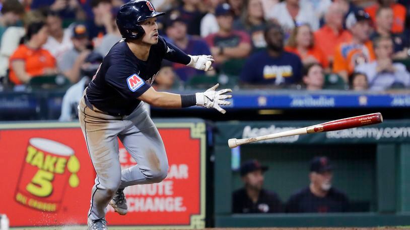Cleveland Guardians' Steven Kwan tosses his bat as he watches his hit for a triple against the Houston Astros during the sixth inning of a baseball game Tuesday, April 30, 2024, in Houston. (AP Photo/Michael Wyke)