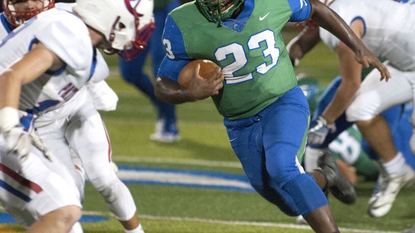 Chaminade Julienne running back Marquis Henry gains big yardage in the first half Friday night at Carroll. Jeff Gilbert/CONTRIBUTED