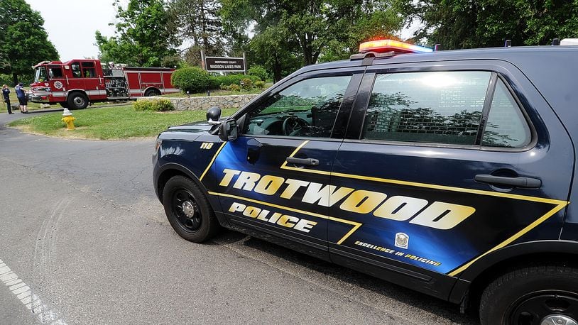 Trotwood police and fire departments blocked the entrance to Madison Lakes Park Monday, June 5, 2023, in Trotwood. A 17-year-old went missing in the lake Sunday, June 4, 2023. MARSHALL GORBY\STAFF