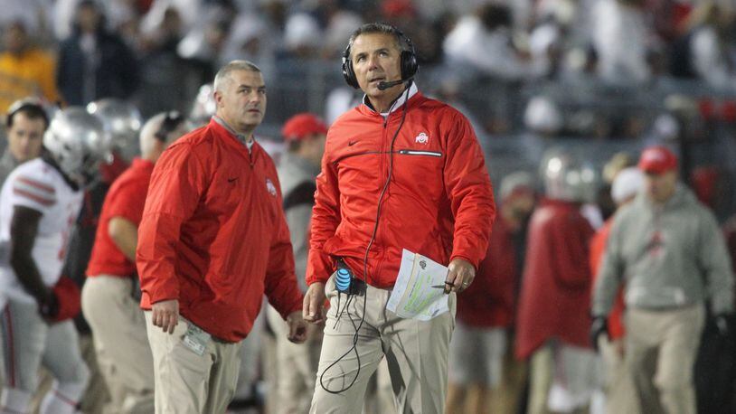 Ohio State’s Urban Meyer walks the sideline during a game against Penn State on Saturday, Oct. 22, 2016, at Beaver Stadium in State College, Pa. David Jablonski/Staff