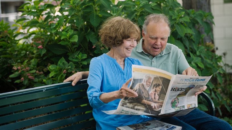 Barb and Joe are reading the In Your Prime special section of the paper.