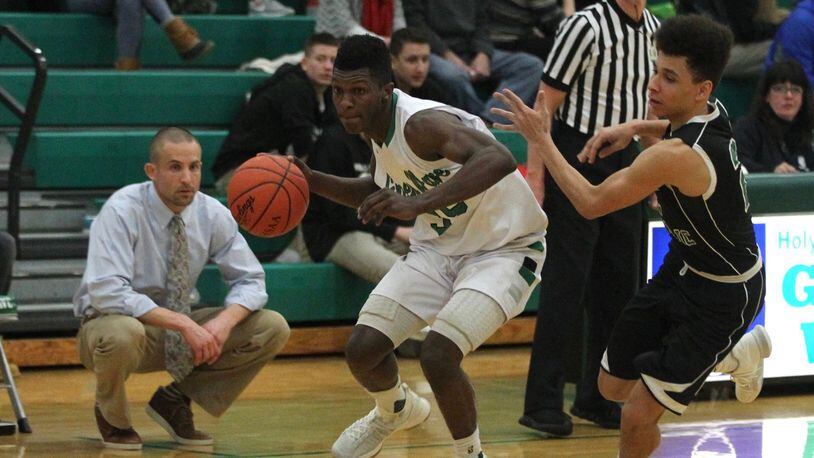 Dayton basketball recruit Dwayne Cohill, of Holy Name High School, plays against Elyria Catholic on Tuesday, Jan. 30, 2018, in Parma Heights, Ohio. David Jablonski/Staff