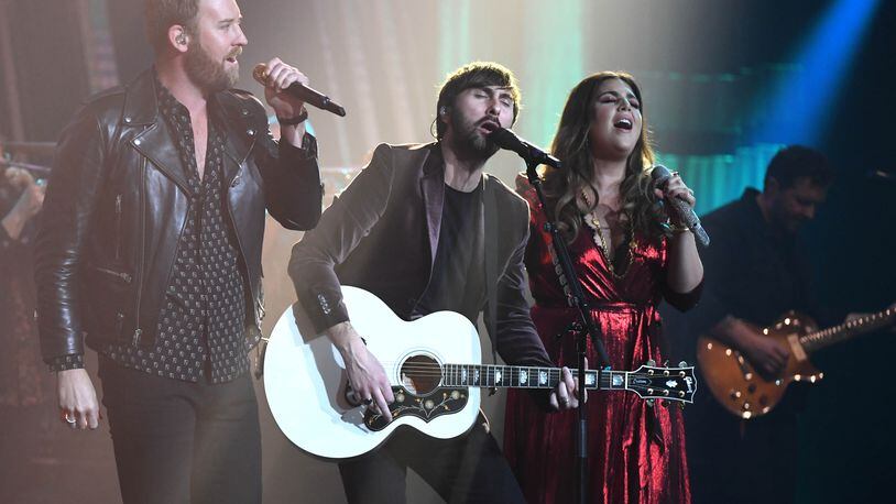 LAS VEGAS, NEVADA - FEBRUARY 08:  (L-R) Recording artists Charles Kelley, Dave Haywood and Hillary Scott of Lady Antebellum perform as the band kicks off its 15-show residency "Our Kind of Vegas" at The Pearl concert theater at Palms Casino Resort on February 8, 2019 in Las Vegas, Nevada.  (Photo by Ethan Miller/Getty Images)