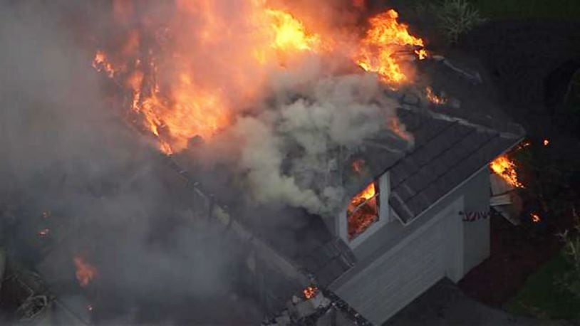 An upscale 5,000-square-foot home near Windermere is a total loss after it was engulfed by a massive blaze likely sparked by a bolt of lightning, officials said. (Photo: WFTV.com)