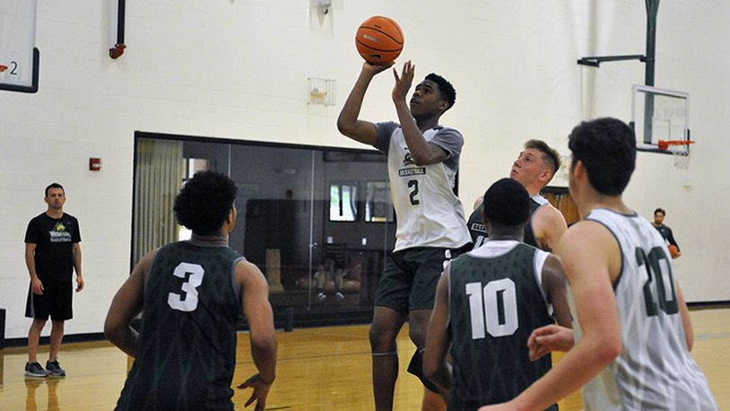 Wright State freshman Malachi Smith puts up a shot during Tuesday’s team workout at Setzer Pavilion. JAY MORRISON/STAFF