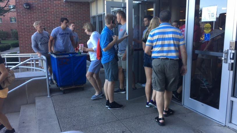 Students in the University of Dayton’s largest and most diverse freshman class in the school’s history began moving into their dorms Friday. The class numbers around 2,250 students. MALIK PERKINS/STAFF