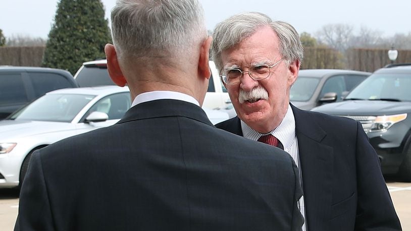 U.S. Secretary of Defense Jim Mattis (L), greets incoming National Security Advisor John Bolton upon his arrival for a meeting at the Pentagon, on March 29, 2018 in Arlington, Virginia. (Photo by Mark Wilson/Getty Images)