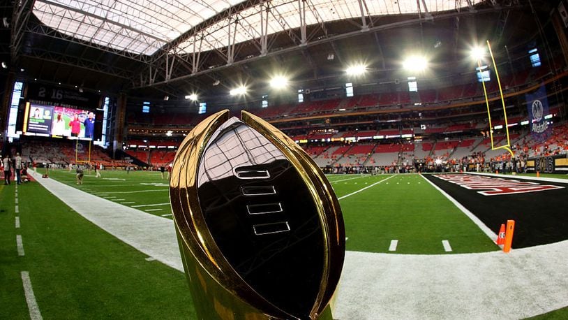 GLENDALE, AZ - JANUARY 11:  The College Football Playoff National Championship Trophy is seen on the field before the 2016 College Football Playoff National Championship Game between the Clemson Tigers and the Alabama Crimson Tide at University of Phoenix Stadium on January 11, 2016 in Glendale, Arizona.  (Photo by Ronald Martinez/Getty Images)