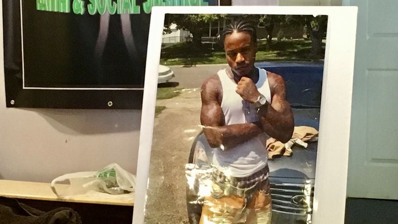 A photo of Jamarco McShann is shown during a press conference announcing a federal wrongful death civil rights lawsuit against Moraine police officers for the fatal shooting of McShann in October 2017. MARK GOKAVI/Staff