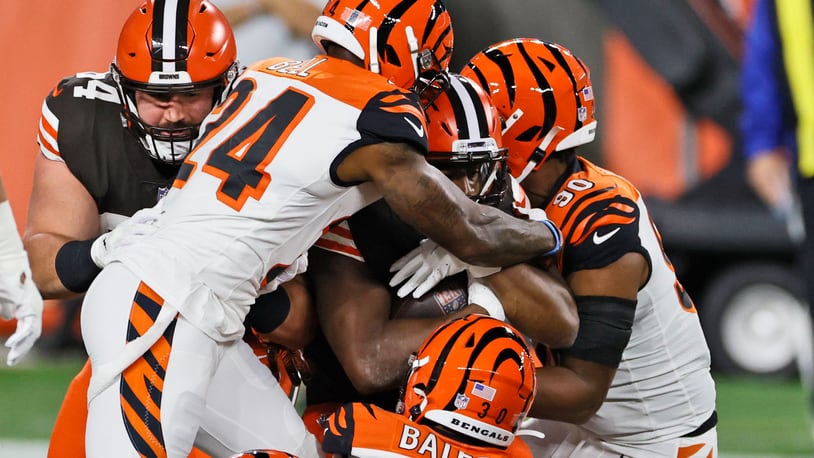 Cleveland Browns running back Nick Chubb, center, rushes for an 11-yard touchdown during the first half of an NFL football game against the Cincinnati Bengals, Thursday, Sept. 17, 2020, in Cleveland. (AP Photo/Ron Schwane)