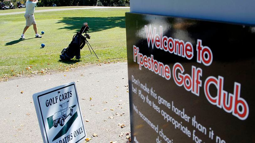 The city of Miamisburg is proposing to sell a piece of land on Pipestone Golf Club to an adjoining property owner who said he mistakenly improved the city-owned land. TY GREENLEES / STAFF