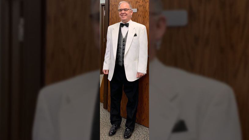 School bus driver Bob Walford donned a tuxedo while treating students to animal crackers and water Tuesday. (Photo: Zionsville Community Schools)