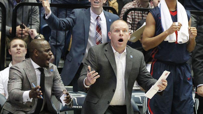 Dayton assistant coach Kevin Kuwik reacts to a call against George Washington on Friday, Feb. 6, 2015, at the Smith Center in Washington. David Jablonski/Staff