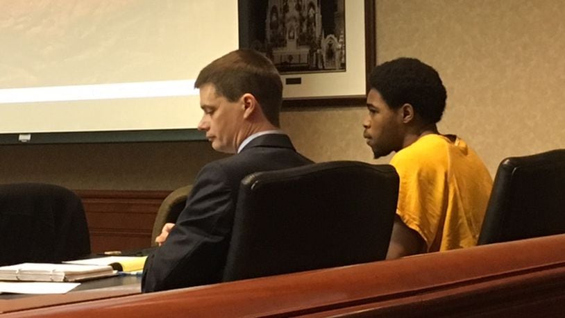 Gonnii White, 17, charged with murder in the shooting death of another teen in May, in court Monday with attorney Tim Upton for a motion to suppress statements he made to detectives. LAUREN PACK/STAFF