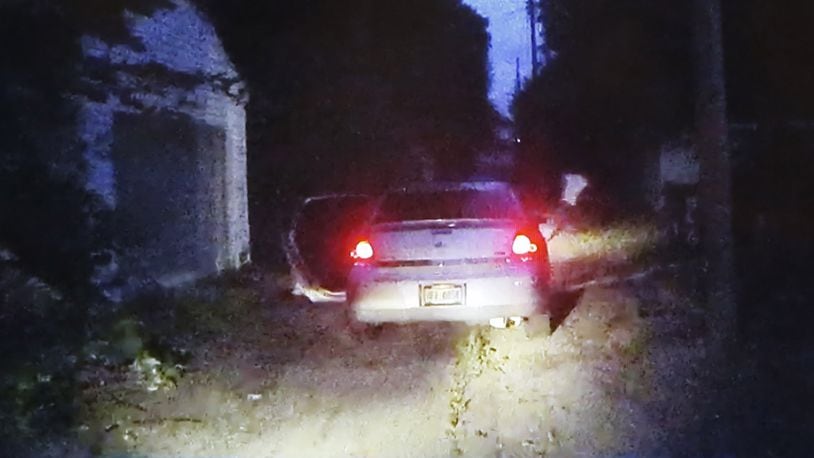 Cruiser camera video shows a suspect fleeing this car during a Dayton Police stop. An officer pursued the suspect. The pursuit ended with a Dayton police officer-involved shooting and the death of the man wounded during an apparent struggle near West Third Street and Delphos Ave. on Thursday night. DAYTON POLICE DEPARTMENT