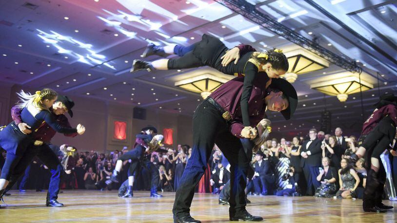The Lil’ Wranglers and Elite Wranglers, of College Station, perform at the 2017 Black Tie and Boots Presidential Inaugural Ball at the Gaylord National Resort and Convention Center in Oxon Hill, Md., on Thursday night. (AP Photo/Kevin Wolf)