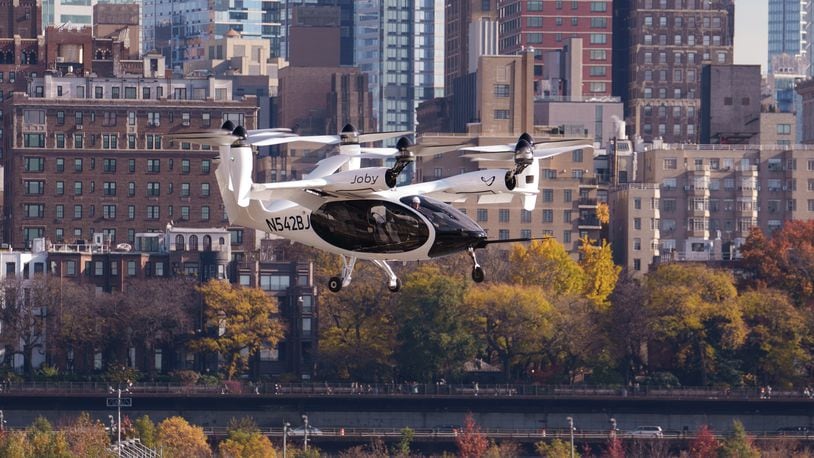 Joby’s electric air taxi in the skies above New York City, piloted by James “Buddy” Denham. Joby Aviation Image