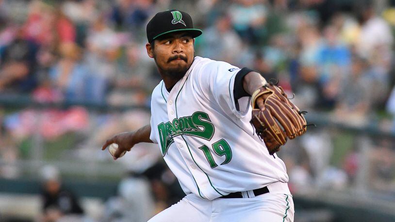 Dragons starter Tony Santillian pitches during the fifth inning Saturday against Lansing at Fifth Third Field. Lansing won 4-1, extending the Dragons’ losing streak to eight. BRYANT BILLING / CONTRIBUTED
