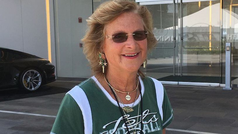 Former New York Jets scout Connie Carberg poses outside the Jets practice facility in Florham Park, N.J., Wednesday, Aug. 9, 2017. (AP Photo/Dennis Waszak Jr.)