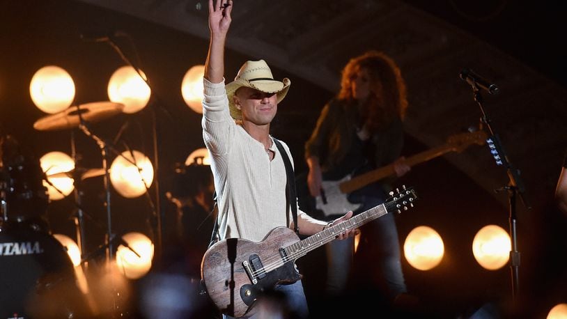 NASHVILLE, TN - DECEMBER 15:  Honoree Kenny Chesney performs onstage during the 2014 American Country Countdown Awards at Music City Center on December 15, 2014 in Nashville, Tennessee.  (Photo by Jason Merritt/Getty Images for dcp)