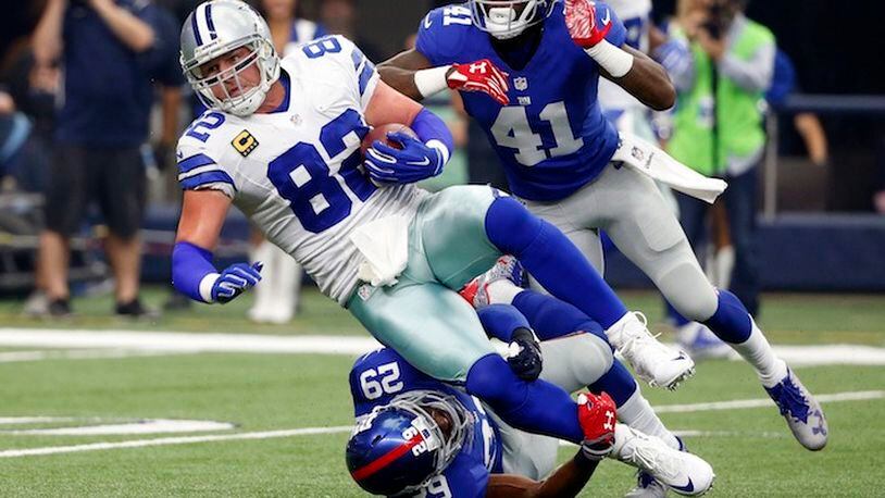 Dallas Cowboys tight end Jason Witten (82) is tackled after a catch by New York Giants free safety Landon Collins (21) and cornerback Dominique Rodgers-Cromartie (41) during an NFL football game on Sunday, Sept. 11, 2016, in Arlington, Texas. (AP Photo/Michael Ainsworth)