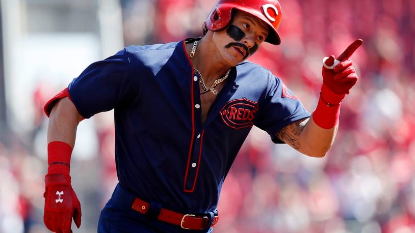 CINCINNATI, OH - MAY 05: Derek Dietrich #22 of the Cincinnati Reds reacts after hitting a solo home run, the team’s third straight, in the first inning against the San Francisco Giants at Great American Ball Park on May 5, 2019 in Cincinnati, Ohio. (Photo by Joe Robbins/Getty Images)